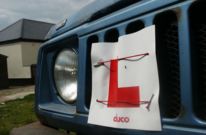L Plate on car